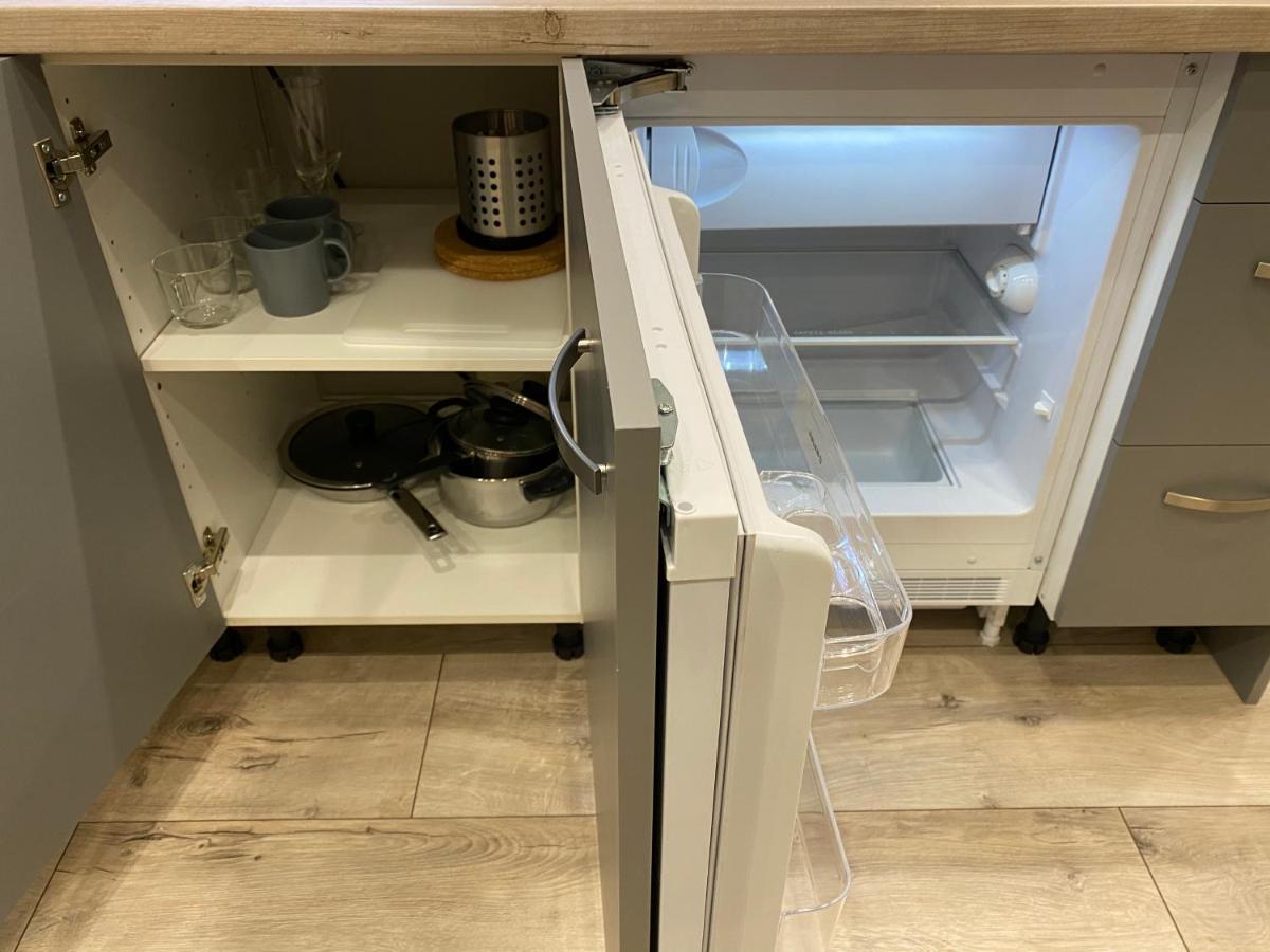 Aparthotel Рига Екстер'єр фото A refrigerator with a built-in ice maker