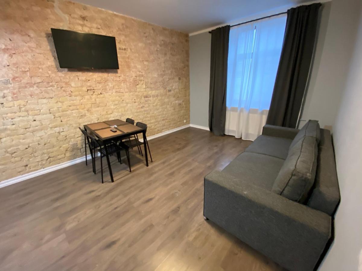 Aparthotel Рига Екстер'єр фото A living room in a typical apartment