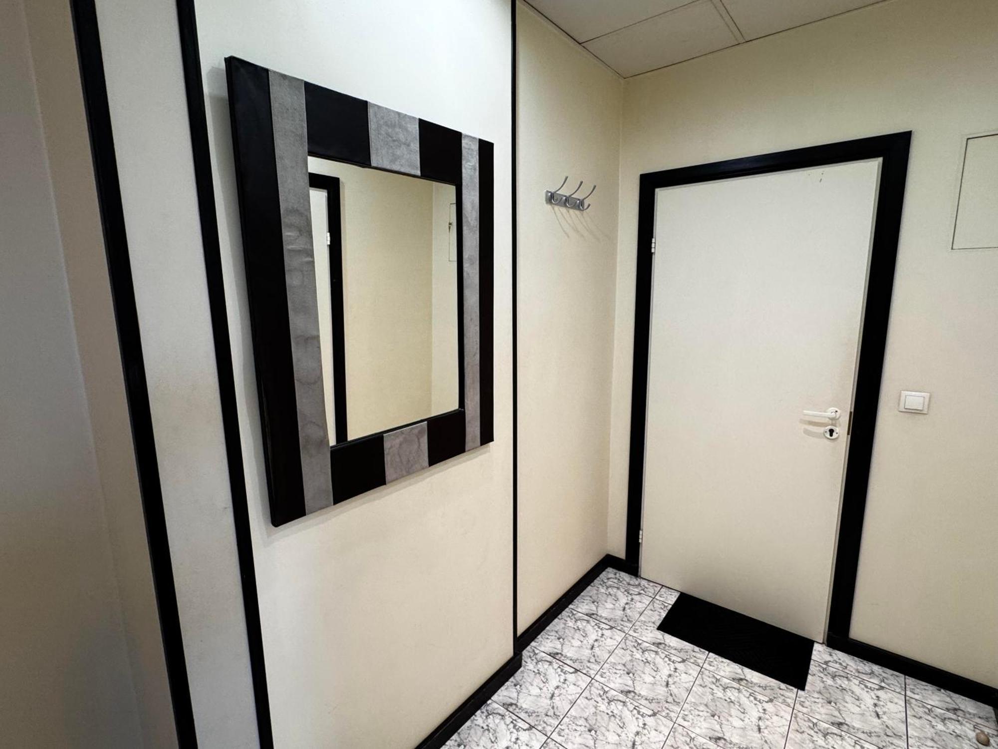 Aparthotel Рига Екстер'єр фото A mirror in a bathroom